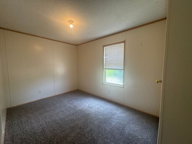 Foto del edificio - Quiet Living: 3-Bedroom Mobile Home Availa...