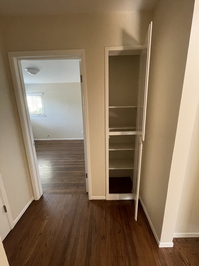 Hall closet / view into 2nd bedroom - 2934 Brookdale Ave