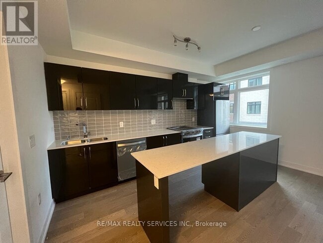 Building Photo - 255-1095 DOUGLAS MCCURDY COMM Dr