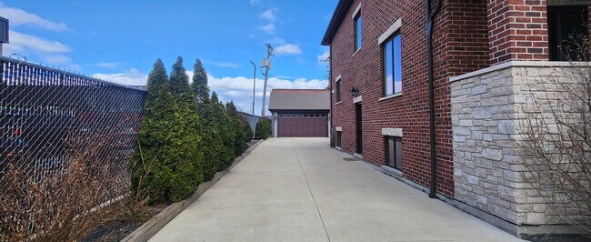 Long Driveway - 7130 W Highland Ave