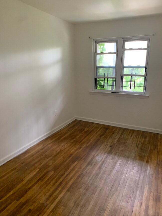 Solid wood floors and walk-in closet - 1156 E 223rd St