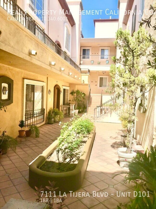 Foto del edificio - Spacious 1 Bedroom Condo with 2 Parking Sp...