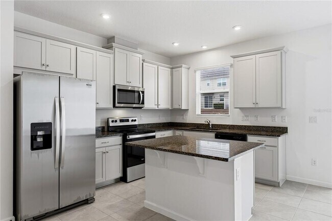 Foto del edificio - 1124 Lakeshore Breeze Pl