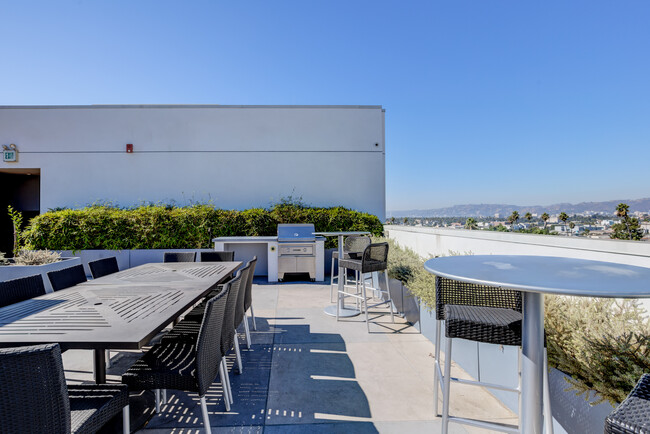 Rooftop BBQ Area - Maya Apartments