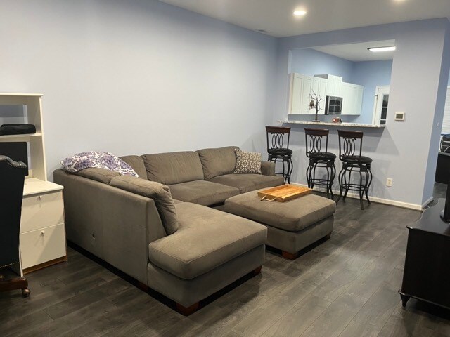 View 1 of living area - 322 Commons Dr