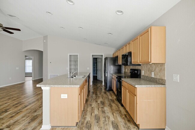 Foto del edificio - 4BR Gated Community Home with Fenced Yard, 2-Car Garage & Open Floor Plan