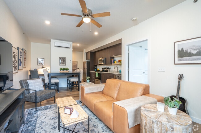 1BR, 1BA - 771SF - Living Room - The Edge at Mountain Shadows