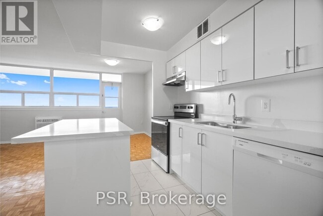 Building Photo - 111-2111 Raglan Ave