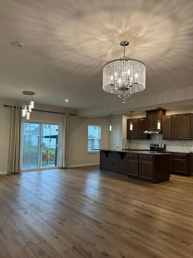 Building Photo - Welcome to this stunning 4-bedroom, 2.5-ba...