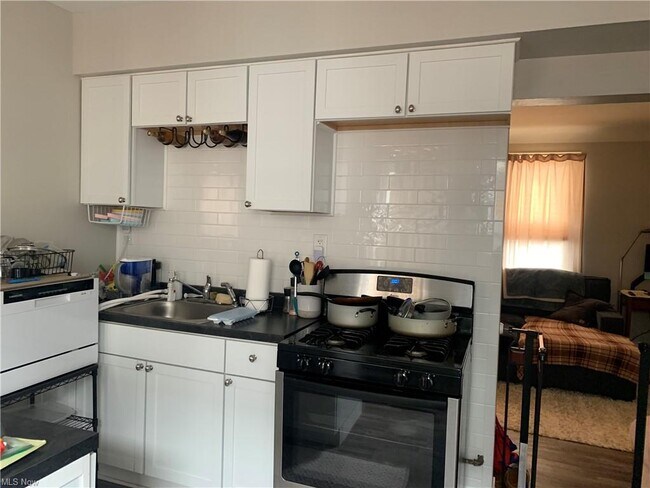 Building Photo - 1360 W 69th St