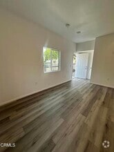 Building Photo - 1441 N Carmelita Ave