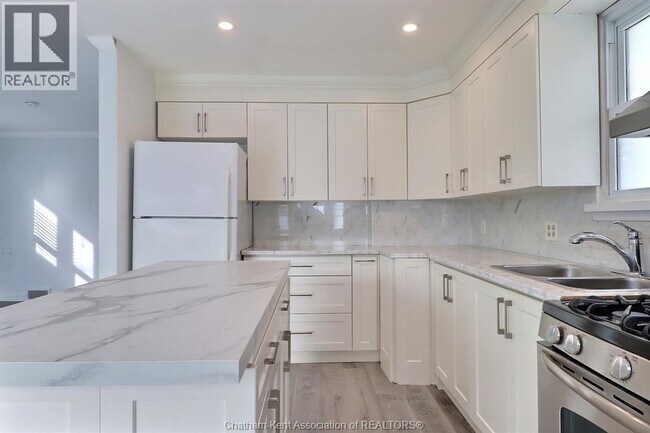 Photo du bâtiment - 33 Wilson Ave