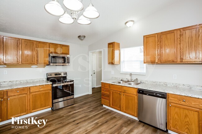 Foto del edificio - 5893 Beau Jardin Dr