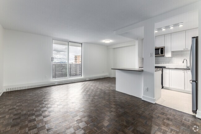 2BR, 1BA - 854SF - Living Room - 1110 Caven St