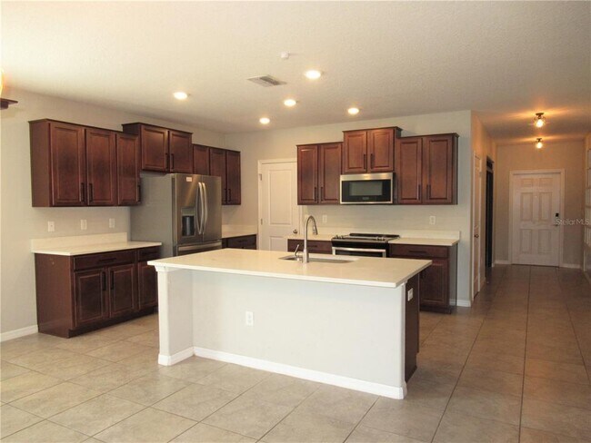 Building Photo - 10120 Rose Petal Pl