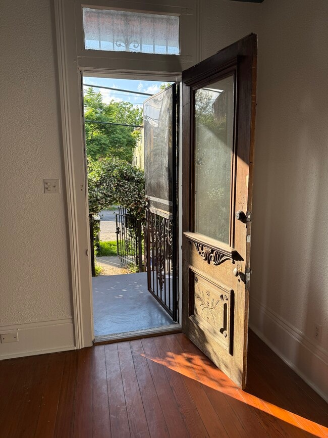 Front porch with security gate - 440 S Rendon St