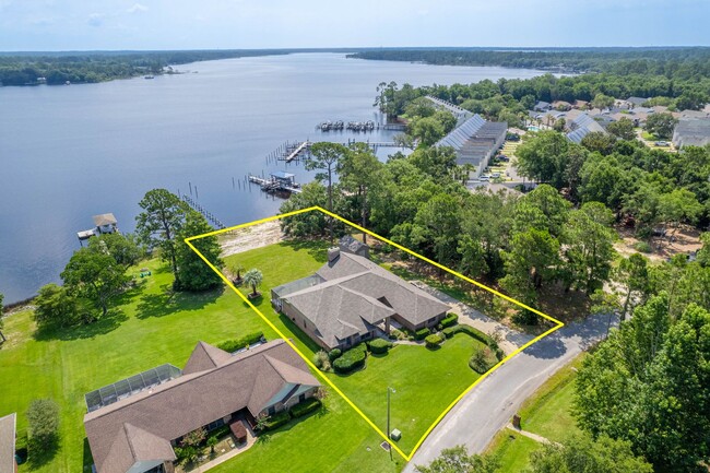 Building Photo - Stunning Waterfront Home with Dock Availab...