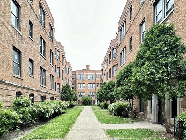 Building Photo - 1369 W Estes Ave