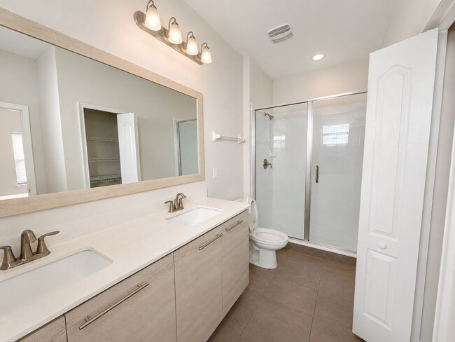 Foto del edificio - Expansive 6-Bed, 6.5-Bath on Angela's Avenue – Your Perfect Haines City Haven!