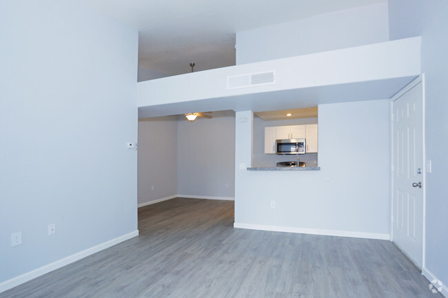 1BR, 1BA - 708 SF Renovated Living Room - Flamingo Chateau