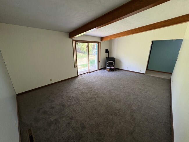 Building Photo - Spacious Home with Attached Garage & Fenced Backyard