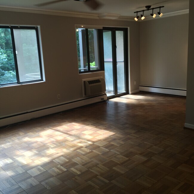 Open living room / dining room with french doors - 2325 42nd St NW