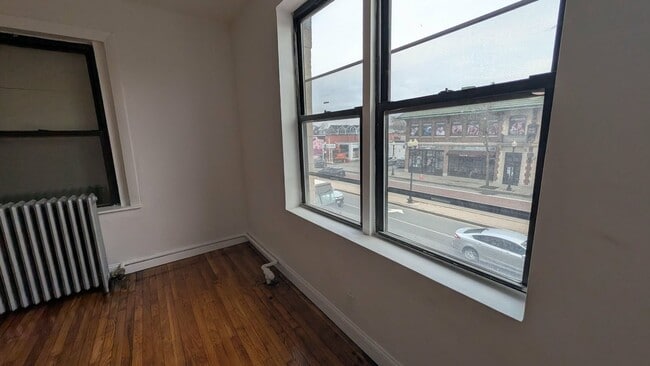 Building Photo - No fee!  Recently remodeled studio with heat and hot water included in the heart of Allston!  Lau...