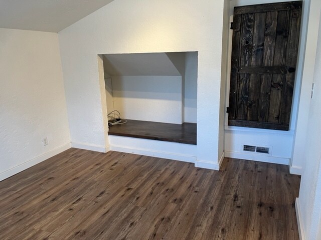 Built in TV area adds extra space to the living room area. Also has a large storage closet. - 1506 N West St