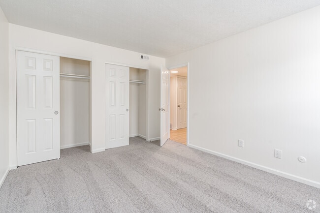 2BR,1BA -845SF - Primary Bedroom - The Lodge at River Village