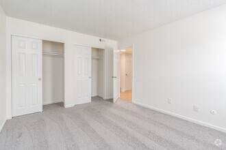 2BR,1BA -845SF - Primary Bedroom - The Lodge at River Village