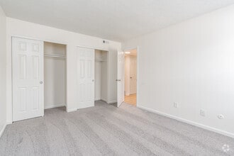2BR,1BA -845SF - Primary Bedroom - The Lodge at River Village