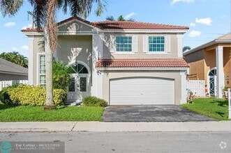 Building Photo - 611 Royal Palm Way