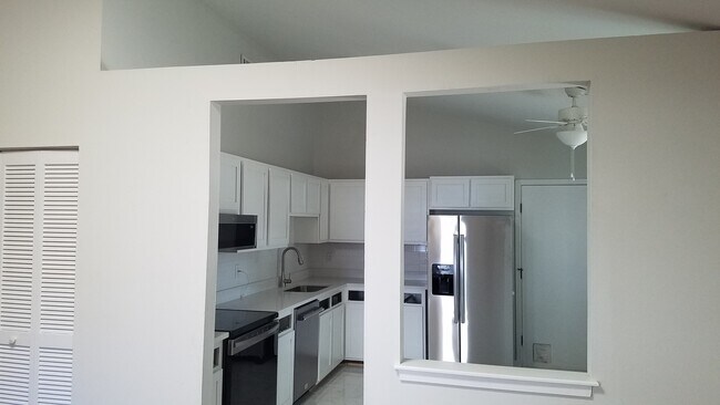 kitchen with room for the breakfast table - 1517 E Crossing Ln