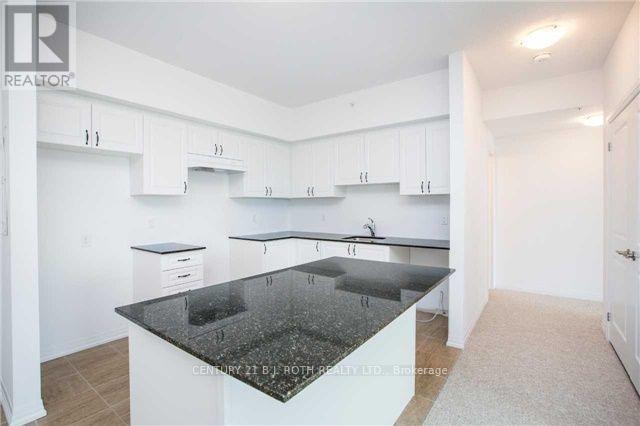 Photo du bâtiment - 306 Essa Rd