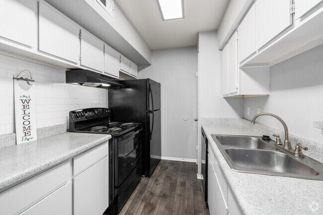 2 habitaciones, 2 baños - 900 pies cuadrados - Cocina - Woodland Trails Apartments