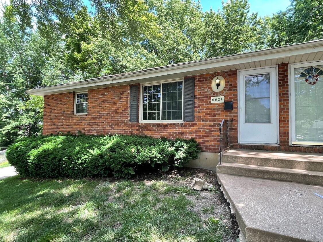 Primary Photo - {6621} Updated Brick Home + 1 Car Garage