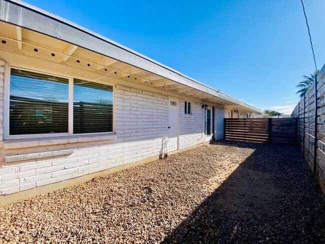 Building Photo - Spacious Design Meets Modern Living in thi...