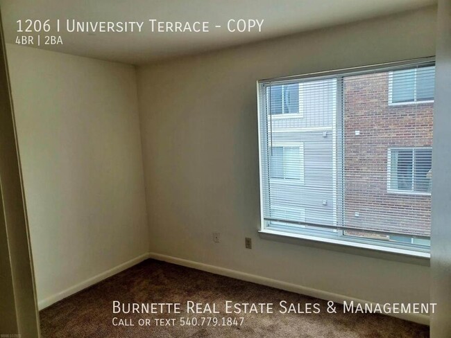 Building Photo - 1206 University Terrace