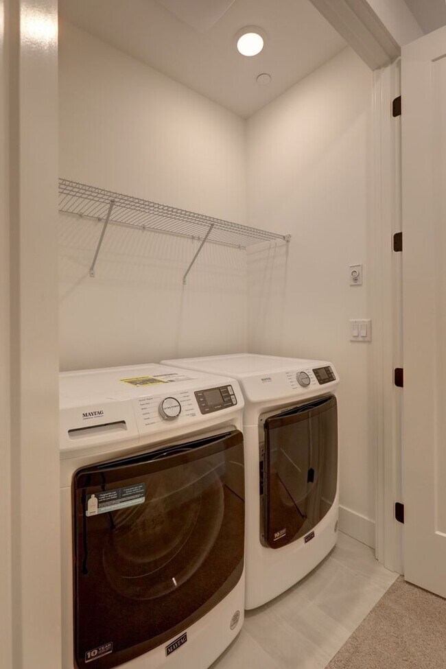 Building Photo - Live Where Style Meets Convenience – 2BR Townhome + Garage