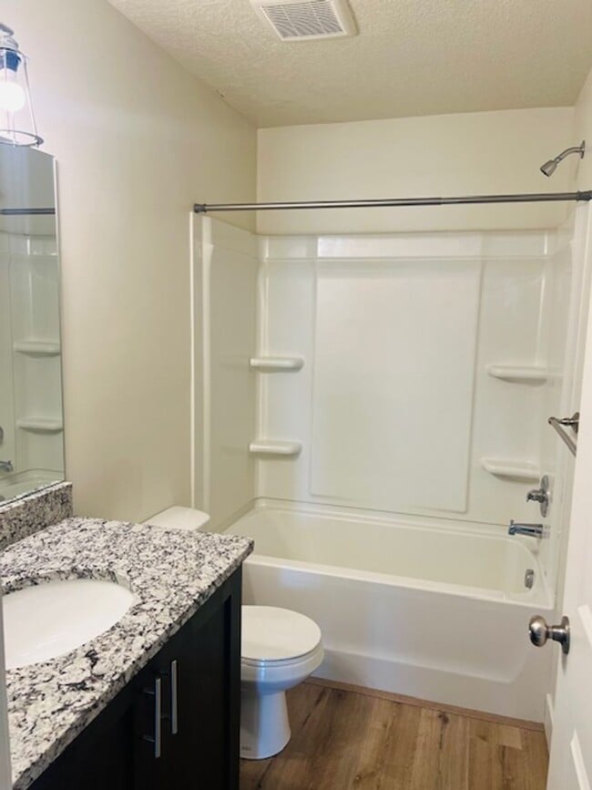 Building Photo - Beautiful townhome with garage and central...