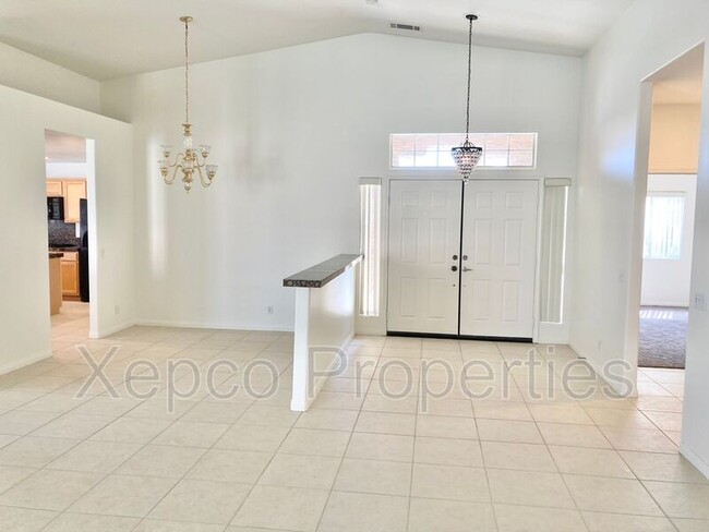 Building Photo - 74130 E Petunia Pl