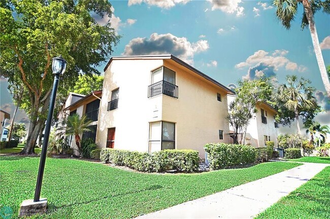 Foto del edificio - 3757 Cocoplum Cir