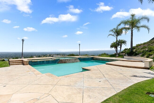 Building Photo - A Private Hillside Haven with Sweeping Val...