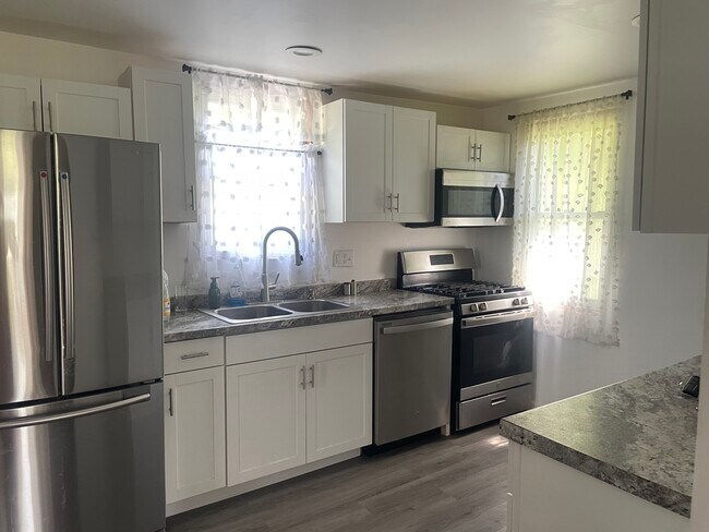 Updated kitchen with all appliances - 26 Tuxill Ave