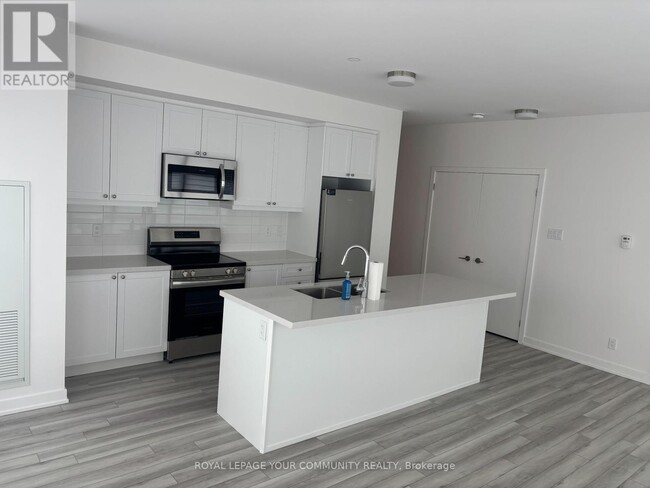 Building Photo - 55-1155 Clarington Blvd