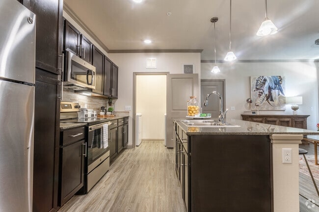 Kitchen and Laundry Room - Oakwood Crossing