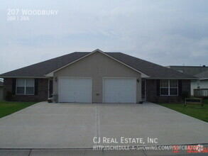 Building Photo - 207 NW Woodbury Dr