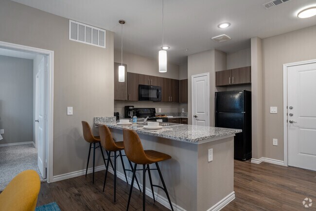 2 habitaciones, 2 baños, 887 pies cuadrados, cocina - Spring Villas- Income Restricted