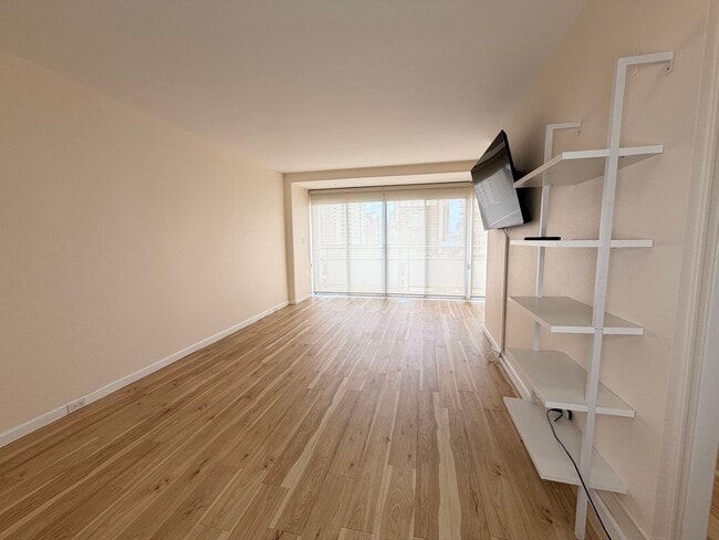Photo - Bright Updated 1 bedroom with covered parking. ALL utilities included Apartment