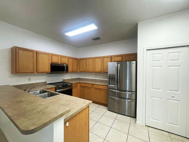 Building Photo - 4 BR 4 BA     POOL HOME     Calabay Park a...